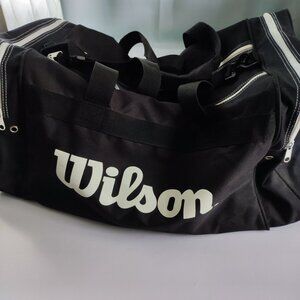 Wilson duffel bag black L 23" / W 11" / H 11" hand & shoulder straps